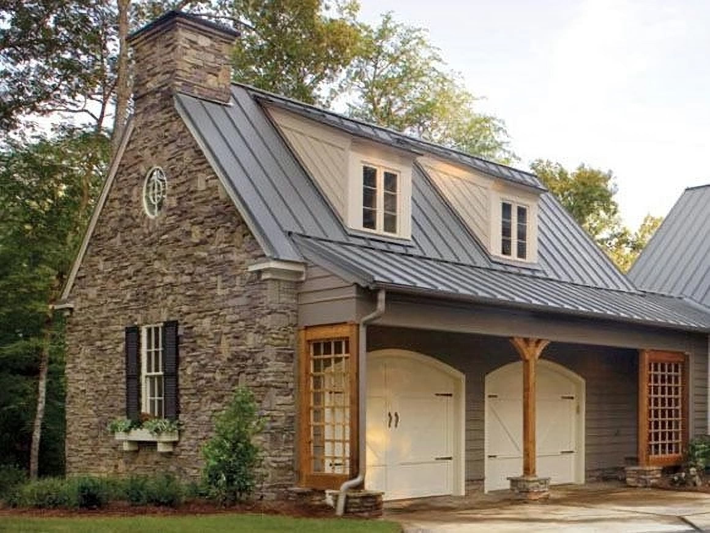 Stone cottage with restored metal standing-seam roof