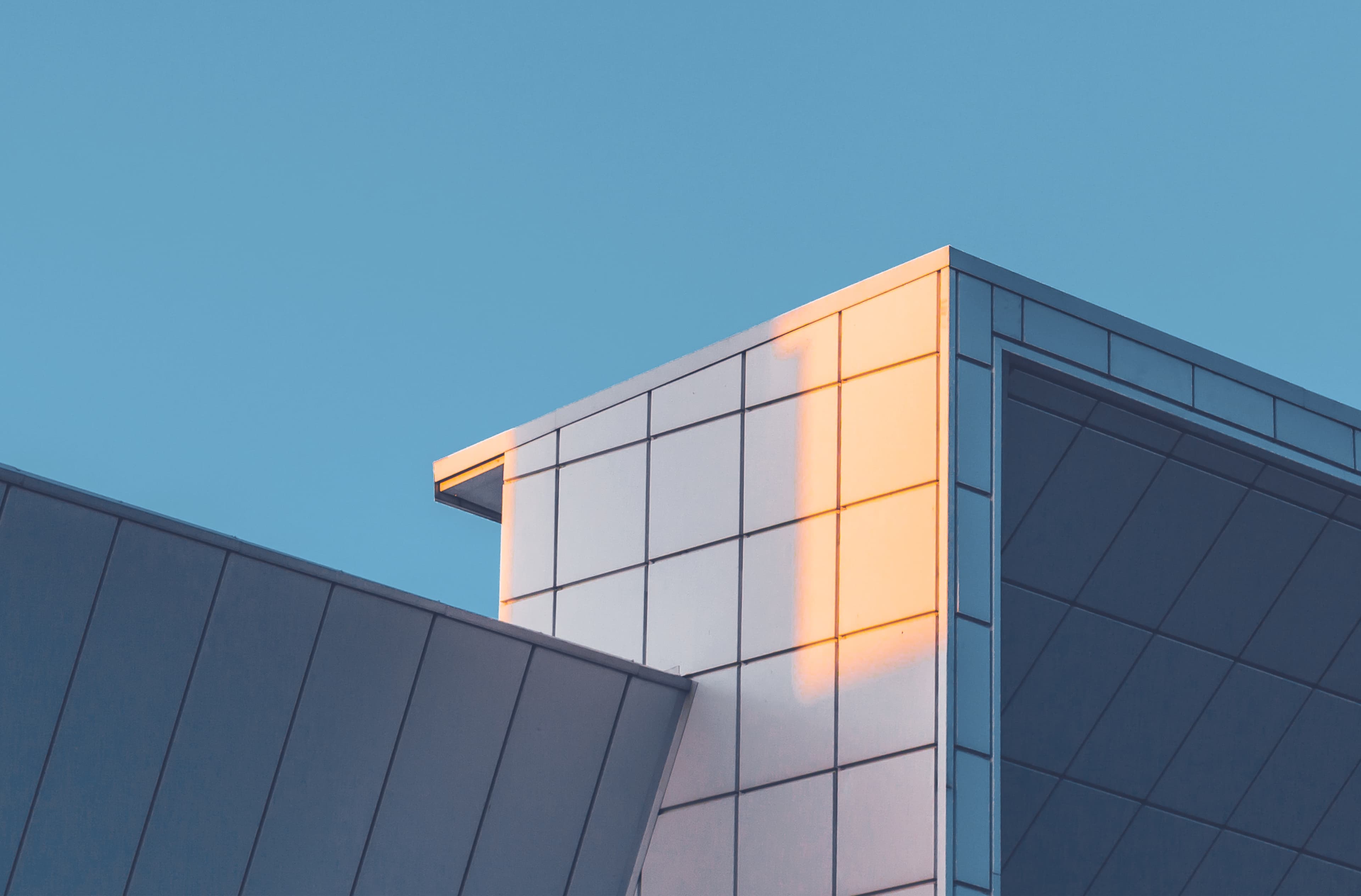 Commercial building corner with modern metal cladding